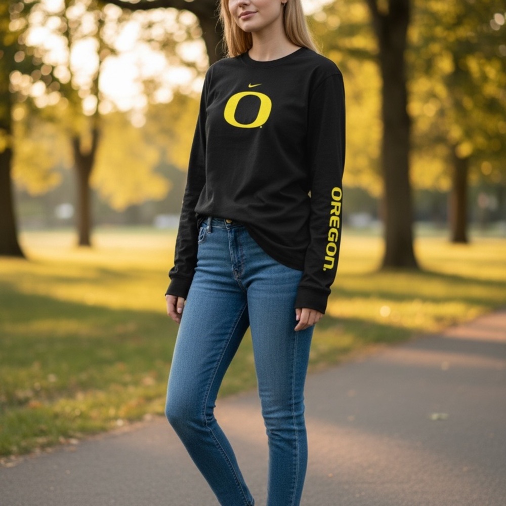Nike Women's Black Long-Sleeve Tee with Yellow Oregon Logo